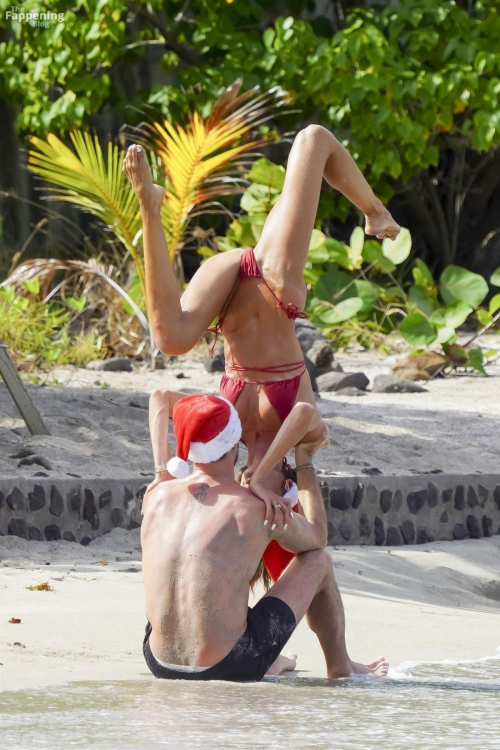 Izabel Goulart Practices Yoga on Beach in St. Barts, December 2024 4