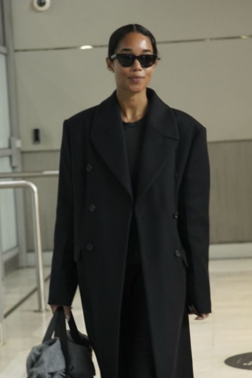 Laura Harrier Wows in Black Ensemble at Paris Airport, January 2025 1