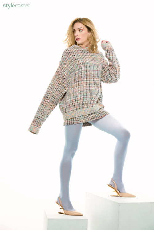 Broanne Howey showcasing modern minimalist styling with oversized tweed sweater, sky blue tights and architectural beige heels for StyleCaster June 2025 fashion spread