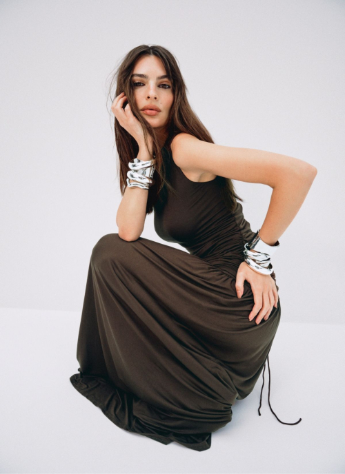 Emily Ratajkowski in brown maxi dress with ruched design and silver bangles for EmRata Collection
