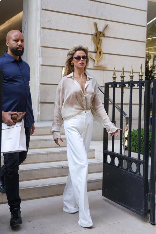 Brooks Nader leaves YSL store Paris, July 2025