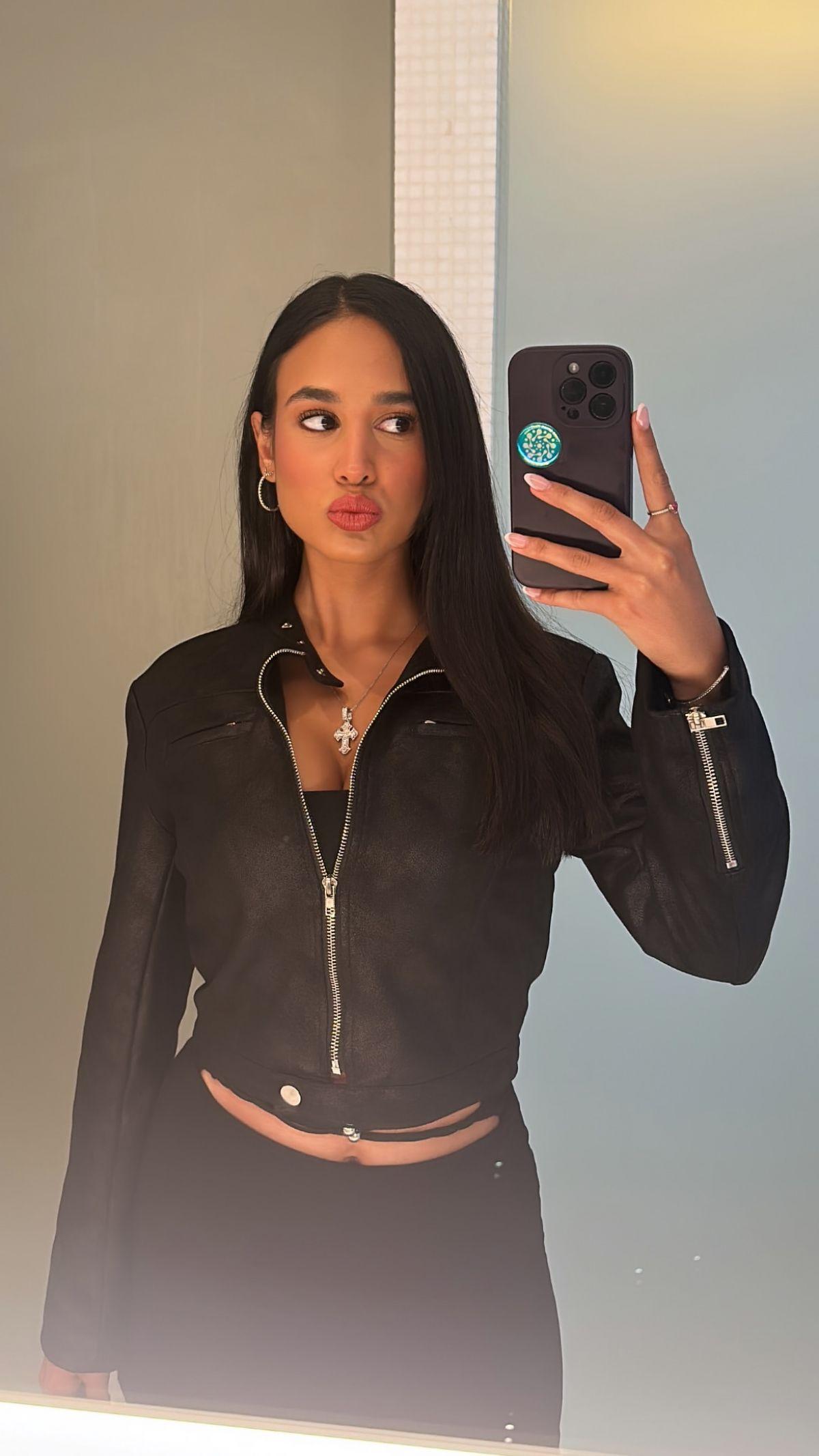 Emily Tosta Instagram Moments July 2025