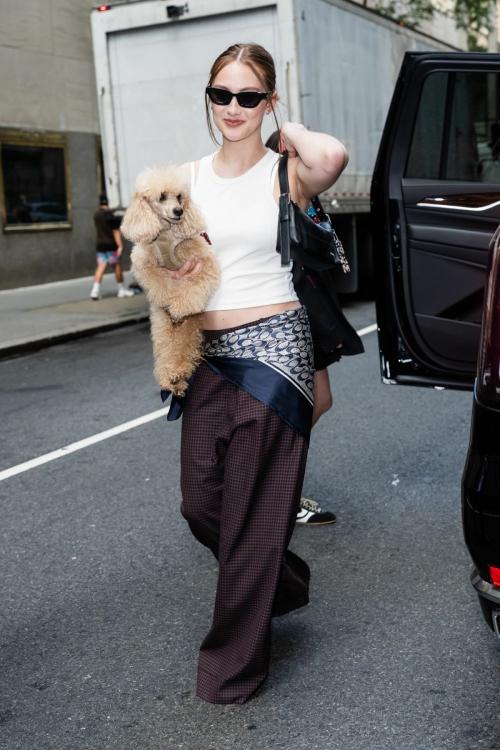 Lola Tung walking dog NYC, July 2025