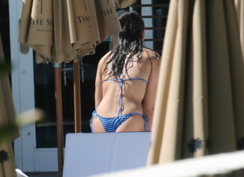 Dua Lipa in blue bikini poolside Miami, September 2025 4
