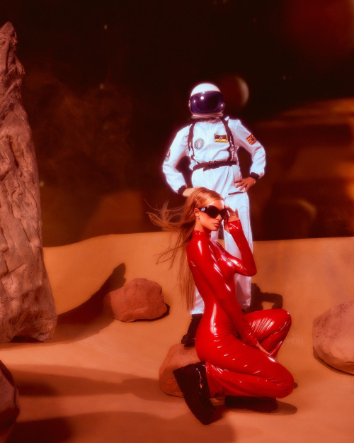 Paris Hilton Dressed as Britney Spears in Red Catsuit, October 2025 10