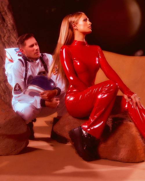 Paris Hilton Dressed as Britney Spears in Red Catsuit, October 2025 12