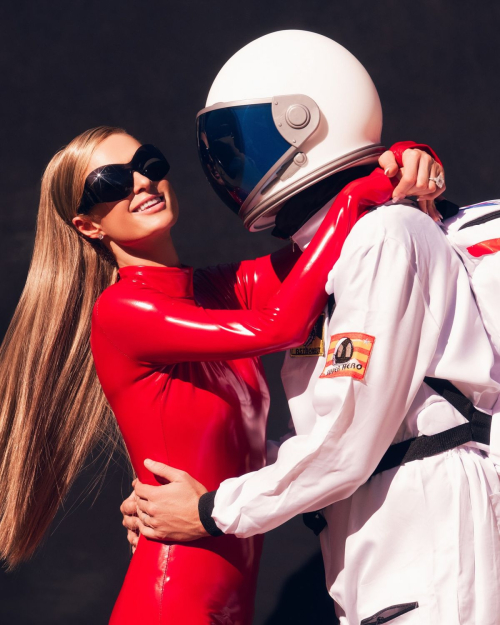 Paris Hilton Dressed as Britney Spears in Red Catsuit, October 2025 13