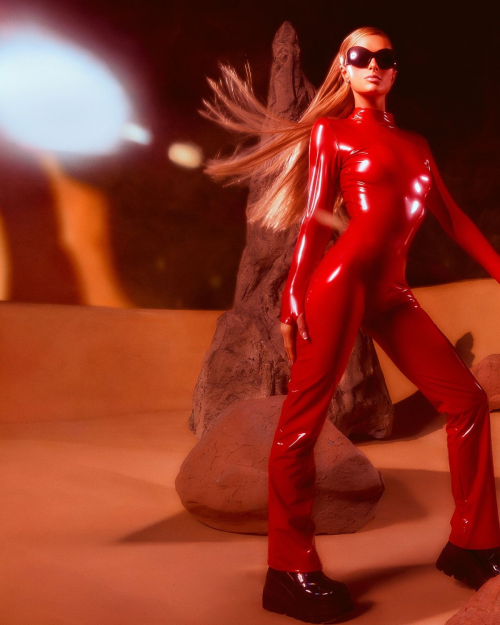 Paris Hilton Dressed as Britney Spears in Red Catsuit, October 2025 3