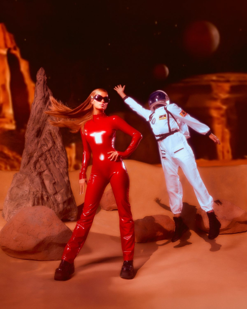 Paris Hilton Dressed as Britney Spears in Red Catsuit, October 2025 4