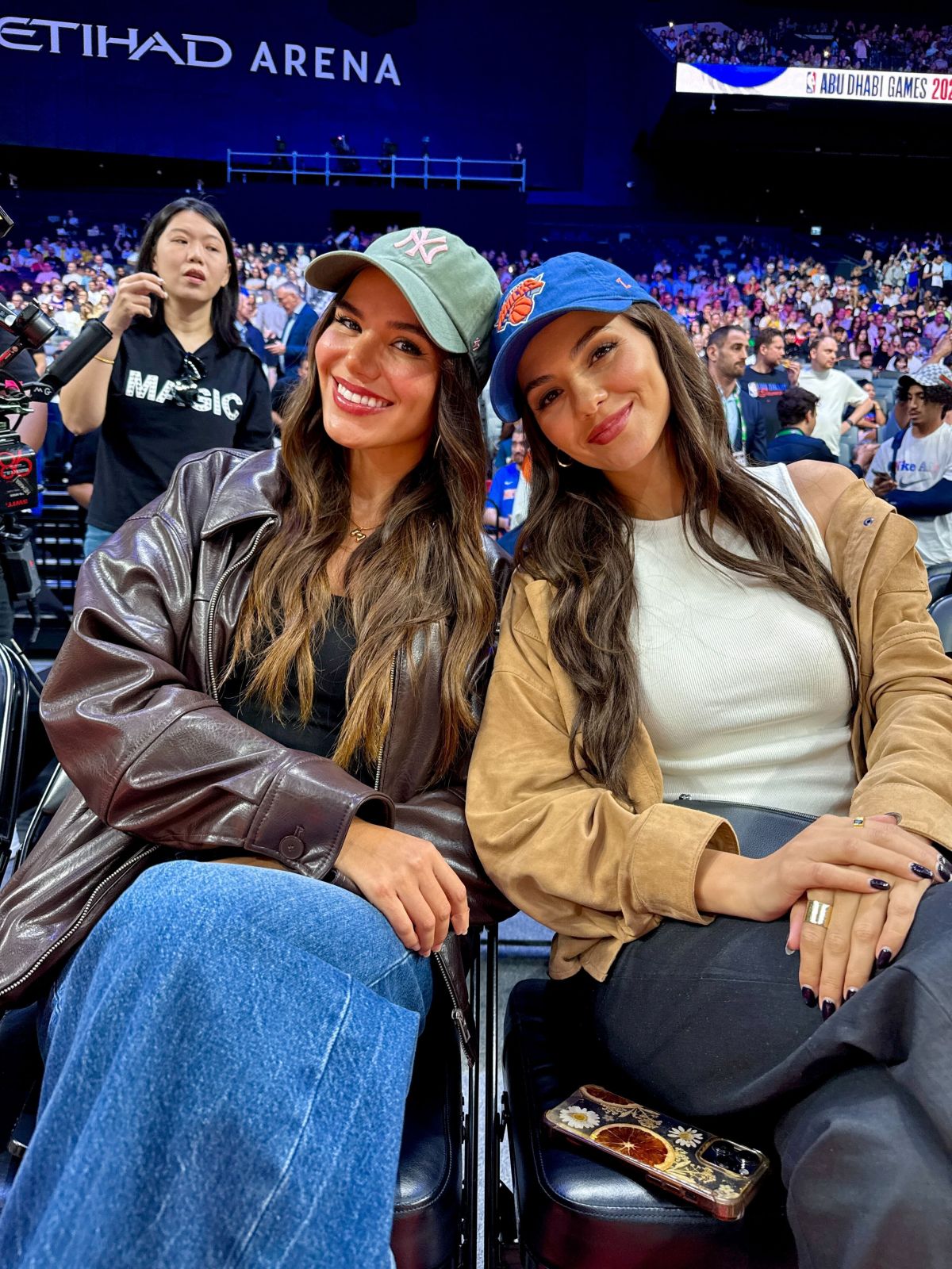 Victoria Justice and Madison Reed at NBA Abu Dhabi Series, October 2025