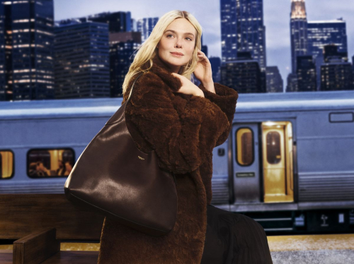 Elle Fanning for Coach The Gift for New Adventures Holiday Campaign, November 2025 1