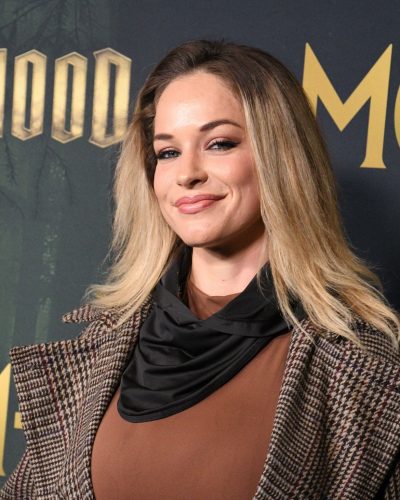 Alexis Knapp wearing stylish look at premiere 2025