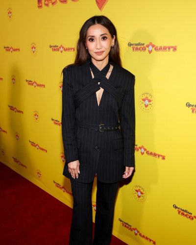 Brenda Song wearing stylish look at premiere 2026