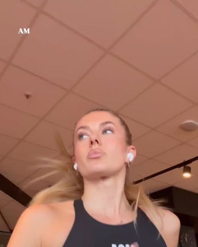 Alica Schmidt eye-catching red dress with graceful silhouette