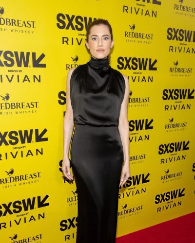 Allison Williams in a tailored black gown with a performance-inspired vibe.