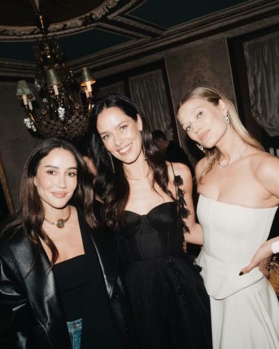 Toni Garrn fitted strapless dress creates captivating silhouette contrast.