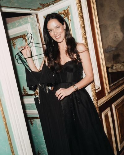 Toni Garrn with sleek hair pulled back to accentuate features.