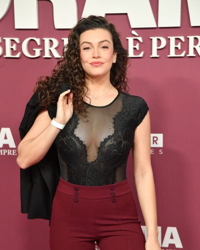 Angelica Baraldi wearing black lace top with intricate design