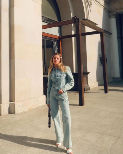 Anna Maria Olbrycht in casual light blue denim and chic accessories