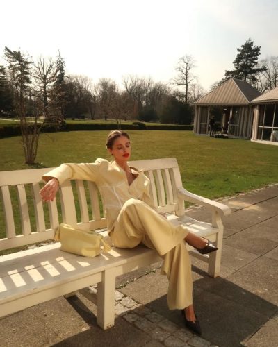 Anna Maria Olbrycht in light blue denim jacket and flared jeans