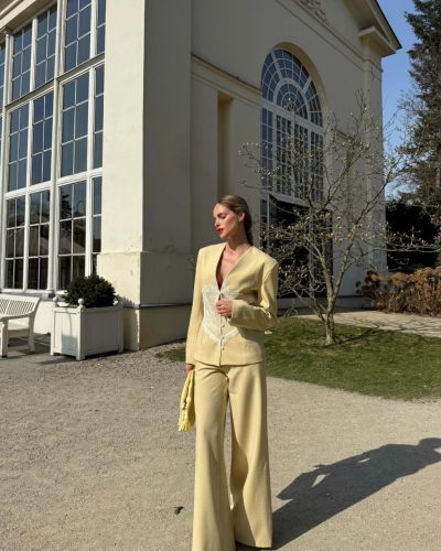 Anna Maria Olbrycht in modern flared jeans and white heels