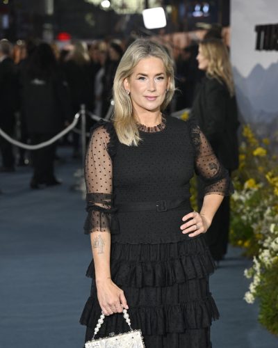 Anna Whitehouse playful tiered ruffles adding movement to dress.