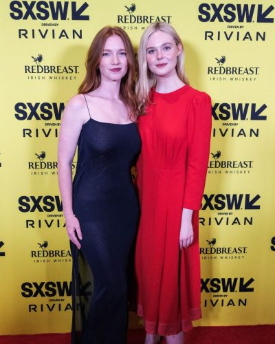 Annalise Basso in black dress paired with nude lip color