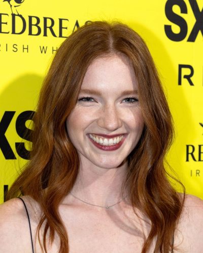Annalise Basso in fitted black gown with understated silhouette