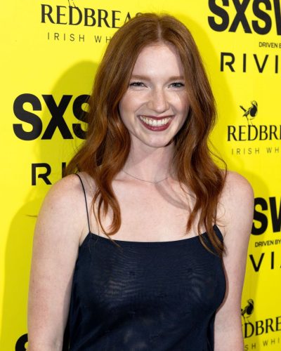 Annalise Basso in black gown with captivating blue eyes