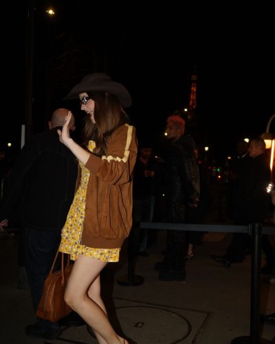 Barbara Palvin in casual floral dress paired with brown high heels