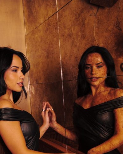 Becky G gold chain belt with snake motif detail