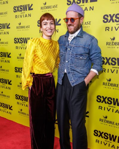 Britt Lower wearing stylish look at premiere 2026