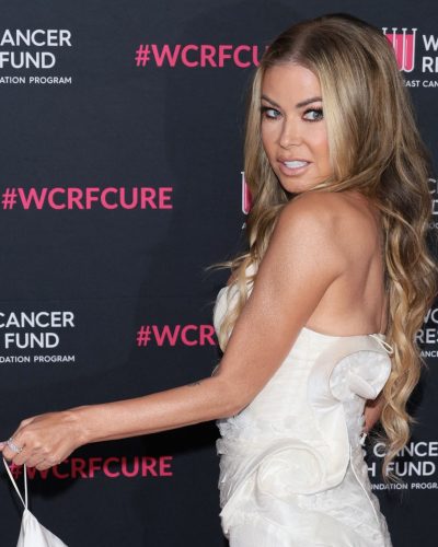 Carmen Electra white gown with a classic design and modern touches