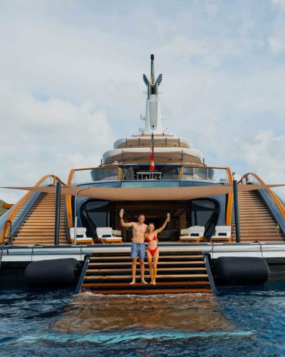 Caroline Wozniacki in playful red bikini, enjoying the summer sun.