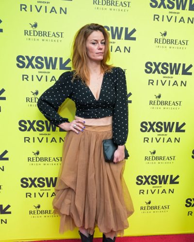 Cassidy Freeman wearing stylish look at premiere 2026