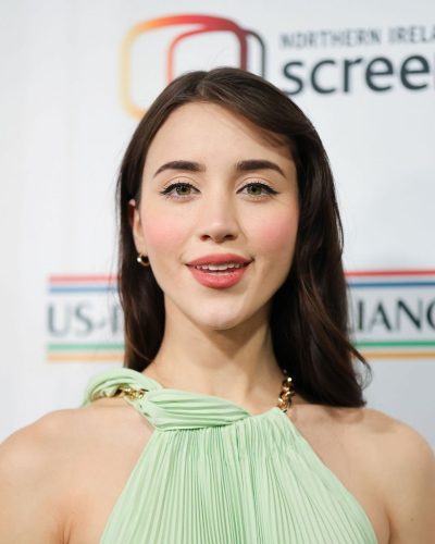 Caylee Cowan flowy dress with soft waves hairstyle