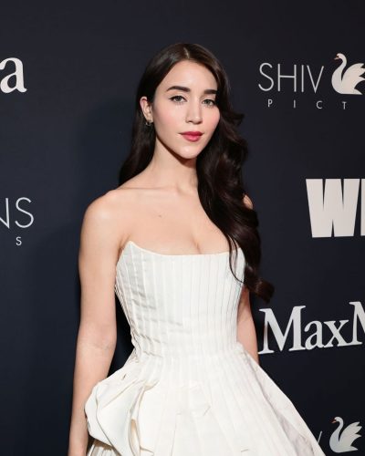 Caylee Cowan wearing elegant white heels with pointed toes.