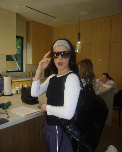 Charli D’Amelio fitted colorful gown with cascading skirt details