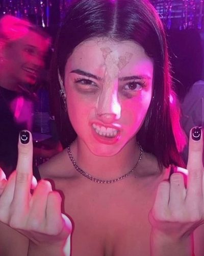 Charli D’Amelio eye-catching gown featuring rich hues and elegant silhouette