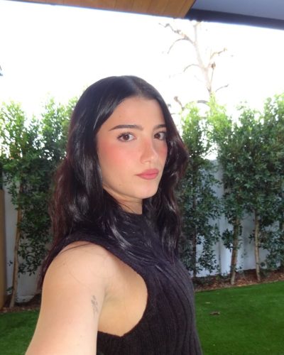 Charli D’Amelio vibrant gown with flowing skirt and eye-catching details