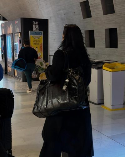 Charli D’Amelio colorful dress with intricate patterns and flowing fabric