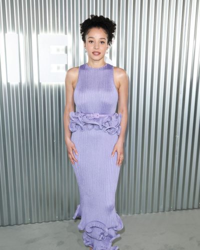 Chase Infiniti modern fashion inspiration in lavender ribbed dress.