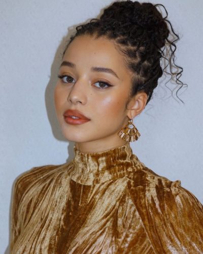 Chase Infiniti In Gold Velvet Dress At Hulu's The Testaments