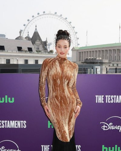 Chase Infinity Charms In Brown Dress At The Testaments 2023