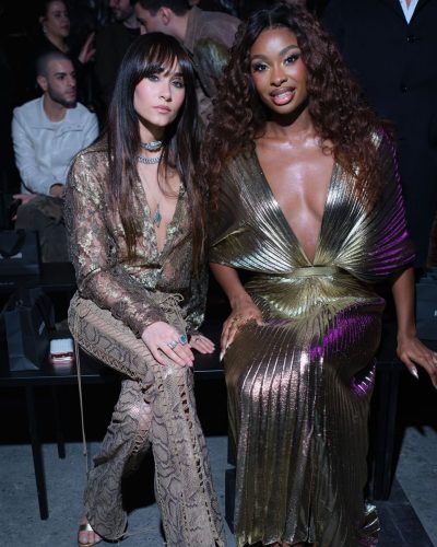 Coco Jones in captivating gold dress with modern flair