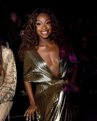 Coco Jones in beautiful gold gown with intricate patterns