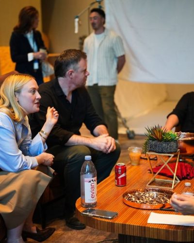 Debby Ryan in classic navy dress with subtle shimmer.