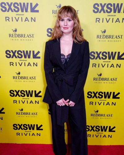 Debby Ryan with loose waves framing her face