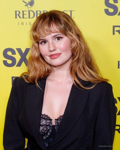 Debby Ryan with soft makeup emphasizing her eyes