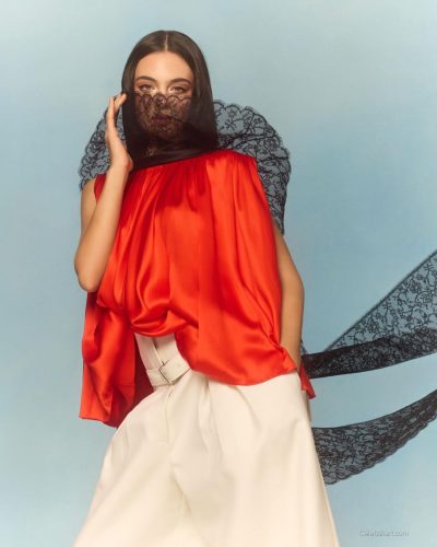 Deva Cassel in chic floral gown with modern cuts.